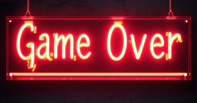 Glowing neon sign with vibrant red outline displaying Game Over in illuminated letters mounted on dark background symbolizing failure, ending, completion, and finality