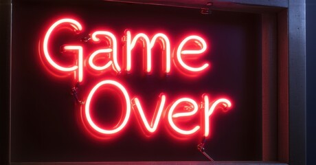 Glowing neon sign with vibrant red outline displaying Game Over in illuminated letters mounted on dark background symbolizing failure, ending, completion, and finality