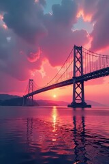 Obraz premium Soft pink and orange tones of sunset paint suspension bridge against grey clouds, sunset, suspension bridge