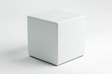 Fototapeta premium A white box sits on top of a table, ideal for use in office or workspace settings