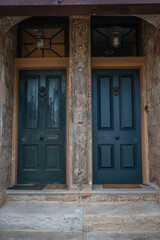Front view of old blue wooden door, vintage blue door house