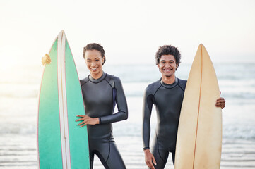 Portrait, sports and surfing friends on the beach together during summer for fun or recreation....