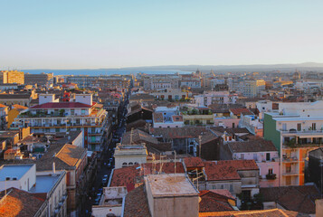City on seashore at sunset. Catania, Sicily, Italy