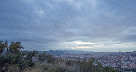 Cloudy sky with a city in the background