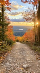 Fototapeta premium Autumnal Path at Sunset: A Serene Mountain View