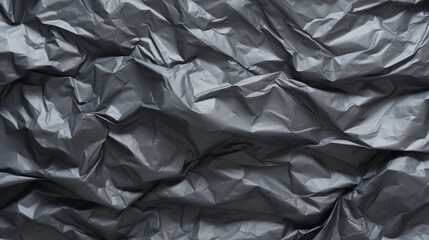 Crumpled Grey Plastic Texture for Seamless Background Design in Digital Art or Presentation with Shiny Finish and Subtle Reflections