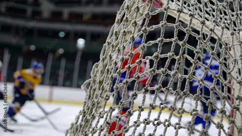 Poster a frozen shot of a net with loose netting threads in sharp detail, while the background reveals quic
