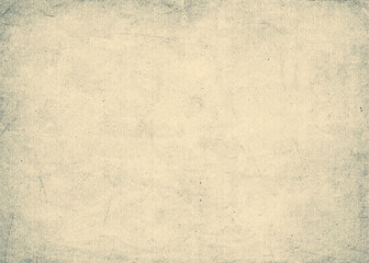 Vintage antique paper background. Old worn ragged parchment sheet. Ancient scratched texture	