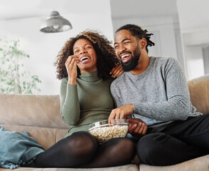 television watching couple tv home woman man remote movie entertainment sofa lifestyle sitting fun...
