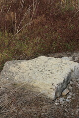 A dry waterfall with natural rocks and stones.