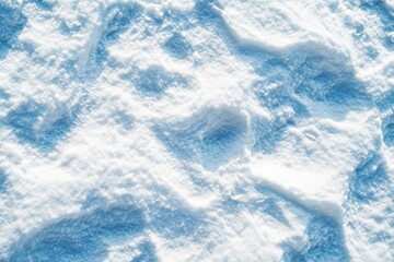 Obraz premium Footprints in freshly fallen snow on a bright winter day in a serene outdoor environment