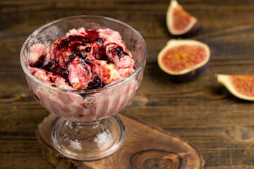 creamy sweet ice cream and sliced red fig fruits