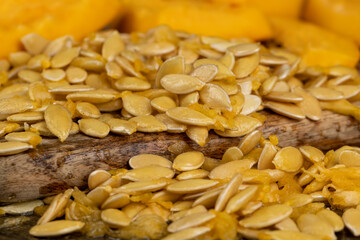 wet fresh seeds of ripe orange pumpkin