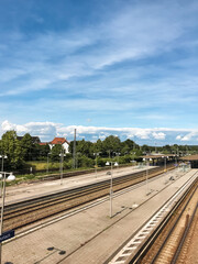 Fototapeta premium Train station with a clear blue sky above it