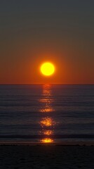 Fototapeta premium Stunning Sunset Over Ocean Beach Scenic View Golden Hour Reflection Tranquil Atmosphere