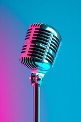 Fototapeta premium An elegant composition of a well-used vintage microphone cable coiling across the stage, the band visible in luminous magenta and cyan backlighting,