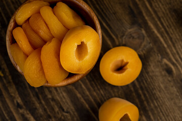 sweet dried pieces of pitted apricots and juicy fresh apricots
