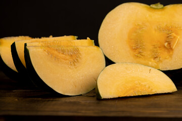 soft ripe orange pumpkin cut into several pieces