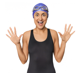 Young Caucasian female professional swimmer receiving a pleasant surprise, excited and raising hands.