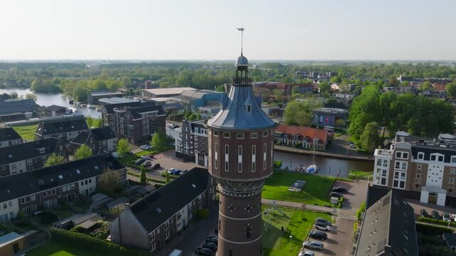 Drone view of Sneek City in a day with historic, iconic Watergate, waterpoort. Aerial Drone Shot in Snkeek, Netherlands
