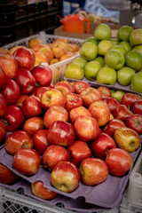 vertical apples for sale in a street market in latin america - food concept