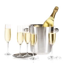 Champagne and bucket with ice isolated on white