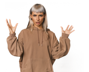 Young caucasian young woman in studio screaming to the sky, looking up, frustrated.