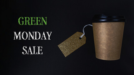 Coffee cup with a tag on it that says Green Monday Sale