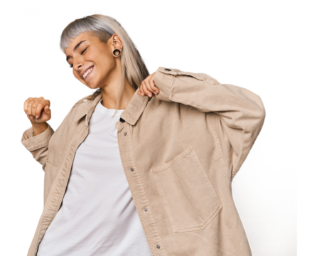 Young caucasian young woman in studio dancing and having fun. - Powered by Adobe