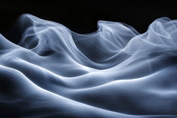 Obraz premium Ethereal Waves of Light Flowing Against a Dark Background