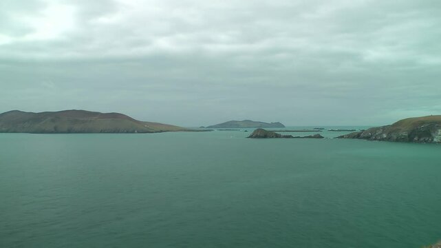 The beautiful coast at Dunmore Head with the Blasket Islands and the sleeping giant in the background, County Kerry, Irland