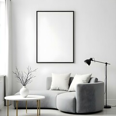 A modern living room featuring a gray curved sofa with decorative cushions. A round white coffee table is in front of the sofa, adorned with a vase containing branches
