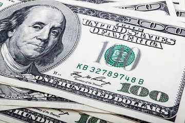 Close up of one hundred dollar banknotes. Business and finance concept.