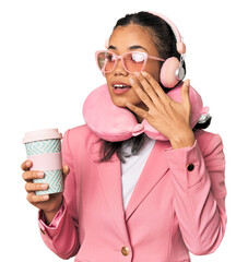 Young Filipina with chic travel accessories in pink tones