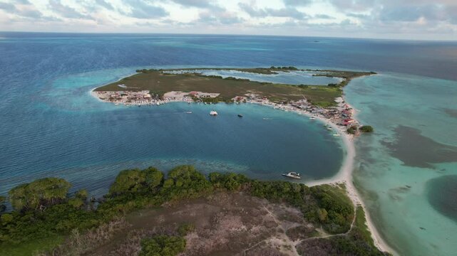 Ayo pirata, los roques, showing turquoise waters and a vibrant coastline, aerial view