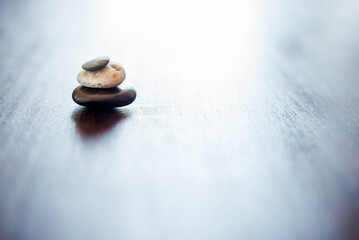 Spa, balance and stones for beauty mockup, wellness and treatment with heat for deep tissue massage. Salon aesthetic, pamper and hot rocks for health, muscle tension and detox for stress relief