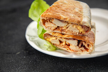donner kebab chicken and vegetables shawarma sandwich tortilla meat filling fast food flatbread fresh tasty food dish gourmet food background on the table rustic food top view copy space