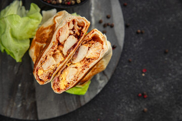 donner kebab chicken and vegetables shawarma sandwich tortilla meat filling fast food flatbread fresh tasty food dish gourmet food background on the table rustic food top view copy space