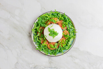 Farmer Italian soft cheese mozzarella served with fresh basil and red cherry tomatoes