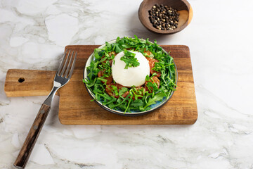 Farmer Italian soft cheese mozzarella served with fresh basil and red cherry tomatoes