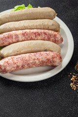 raw sausages pork, beef, chicken, lamb fresh tasty food dish gourmet food background on the table rustic food top view copy space