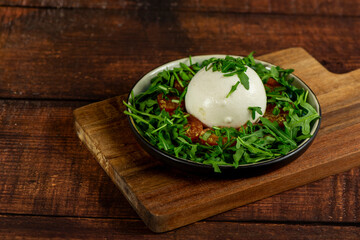 Farmer Italian soft cheese mozzarella served with fresh basil and red cherry tomatoes