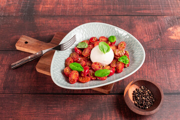 Farmer Italian soft cheese mozzarella served with fresh basil and red cherry tomatoes