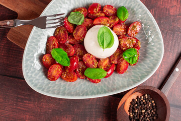 Farmer Italian soft cheese mozzarella served with fresh basil and red cherry tomatoes