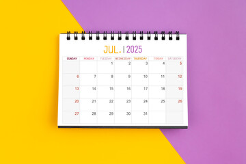 July 2025 Monthly desk calendar for 2025 year on yellow and purple.