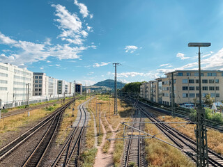 Train track with a city in the background