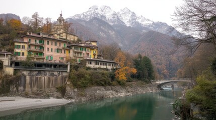 Fototapeta premium Alpine village autumn river bridge mountains
