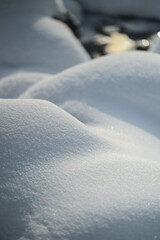 snow texture in the forest with unfrozen river
