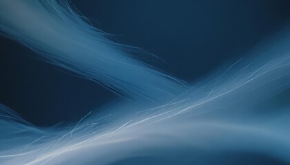 Abstract Blue Swirls: An ethereal abstract image featuring flowing, translucent blue swirls against a deep navy background.  The image evokes feelings of serenity and mystery. 