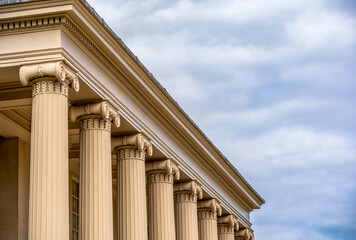 Ornate Ionic Columns Embodying Neoclassical Elegance Beneath a Subdued Sky